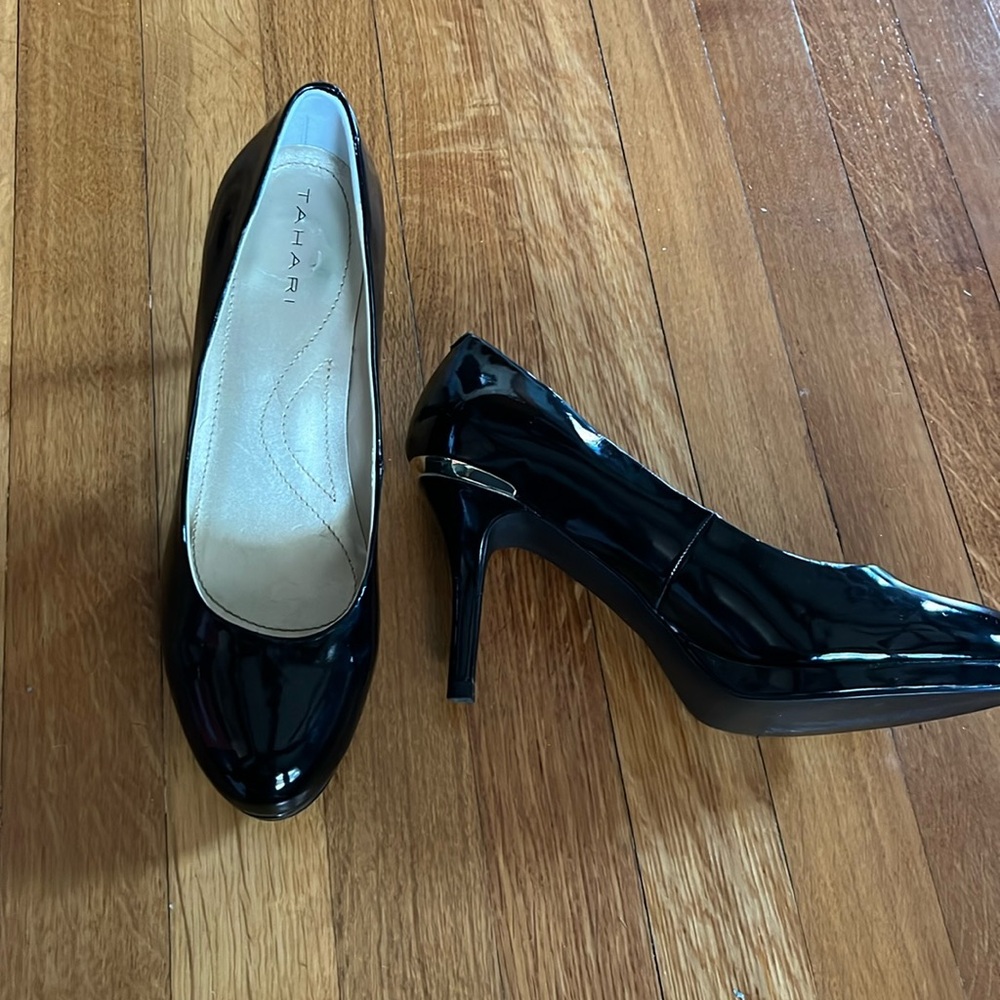 Tahari black patent leather pump.